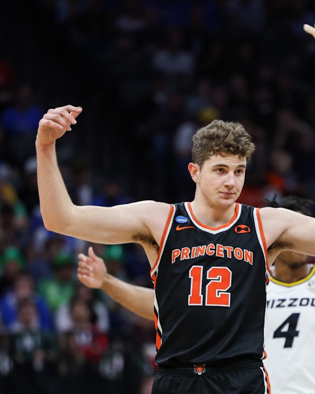 Princeton players celebrate during their men’s NCAA tournament win over Missouri.